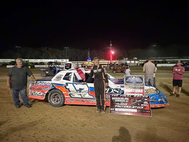 Nevin Gainey rings the final bell of The Final Round of the Borderline Brawl